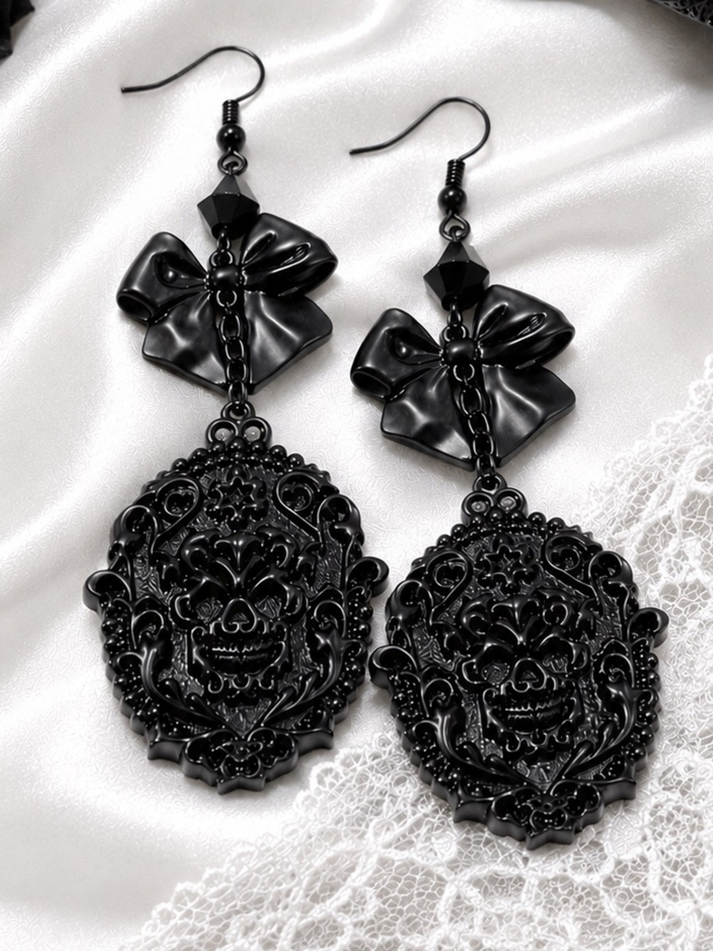 KILLSTAR Damsel Skull Cameo Filigree Bow Detail Dangle Earrings Black